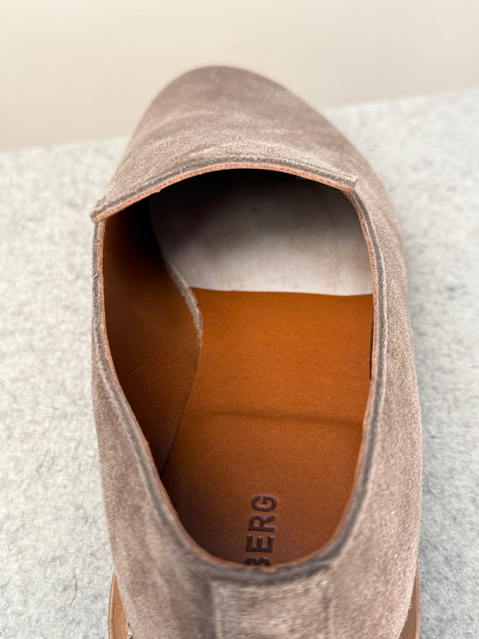 Viberg Bison Janus calf suede slippers featuring a soft, tan leather exterior and casual slip-on design.