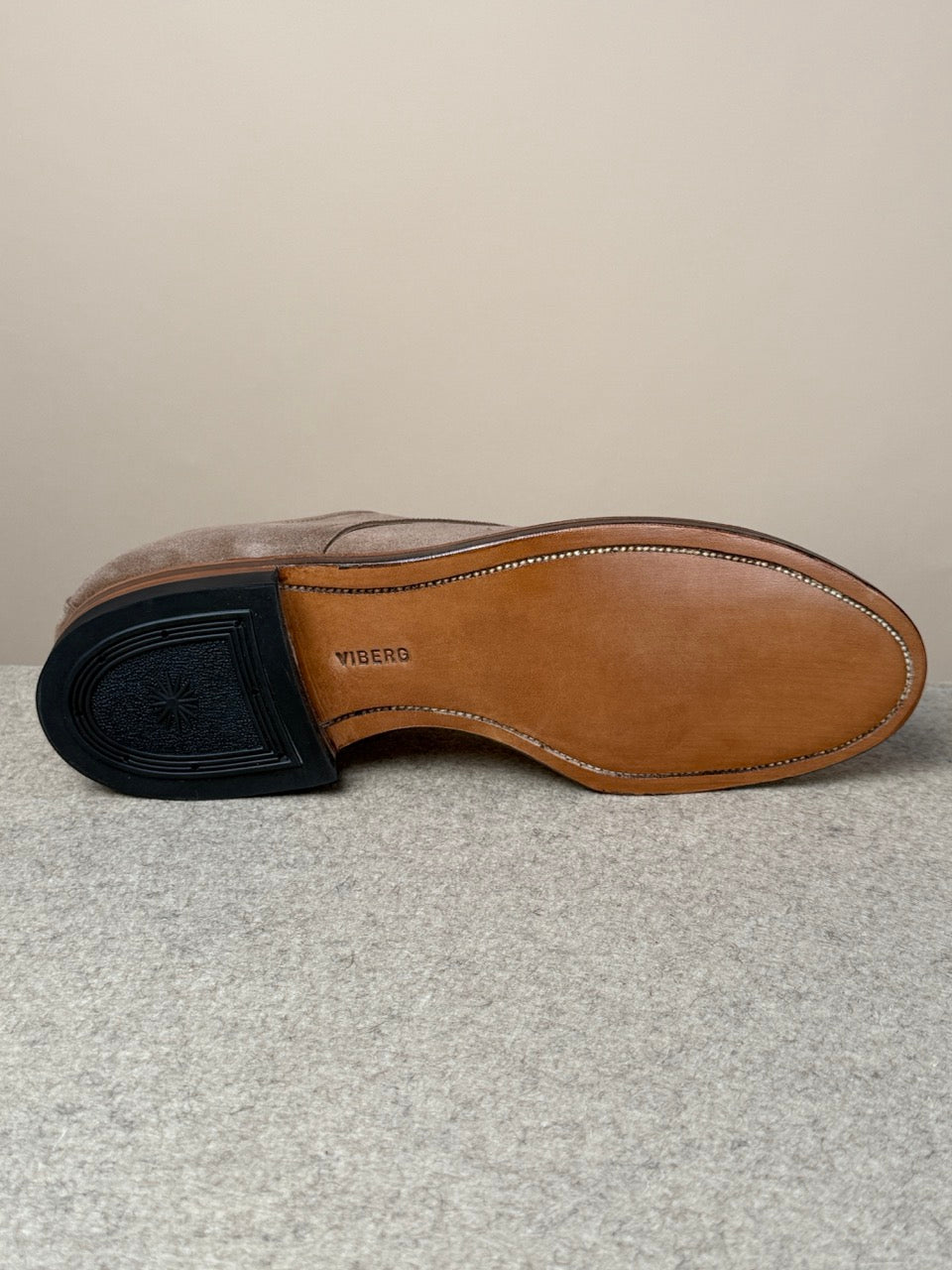 Viberg Navvy Cut Shoe in Bison Janus calf suede, showcasing its sleek design and rich texture on the footwear.
