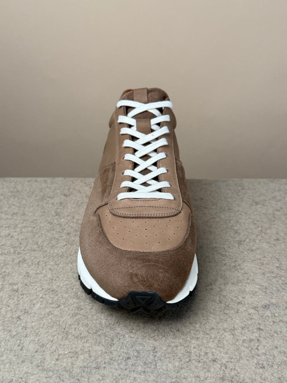 Viberg Bison Janus calf suede sneaker showing tan suede upper with detailed stitching and durable rubber sole.
