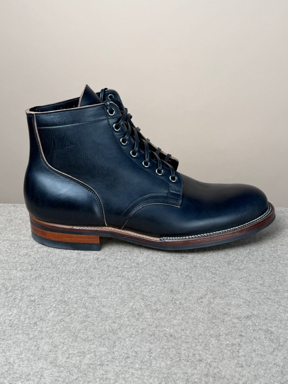Black Viberg Service Boot 2030 in Chromexcel leather, showcasing rugged footwear with sturdy soles and classic design.