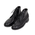 Viberg Service Boot 2030 in black Chromexcel leather, showcasing the rugged footwear with sturdy sole and sleek design.